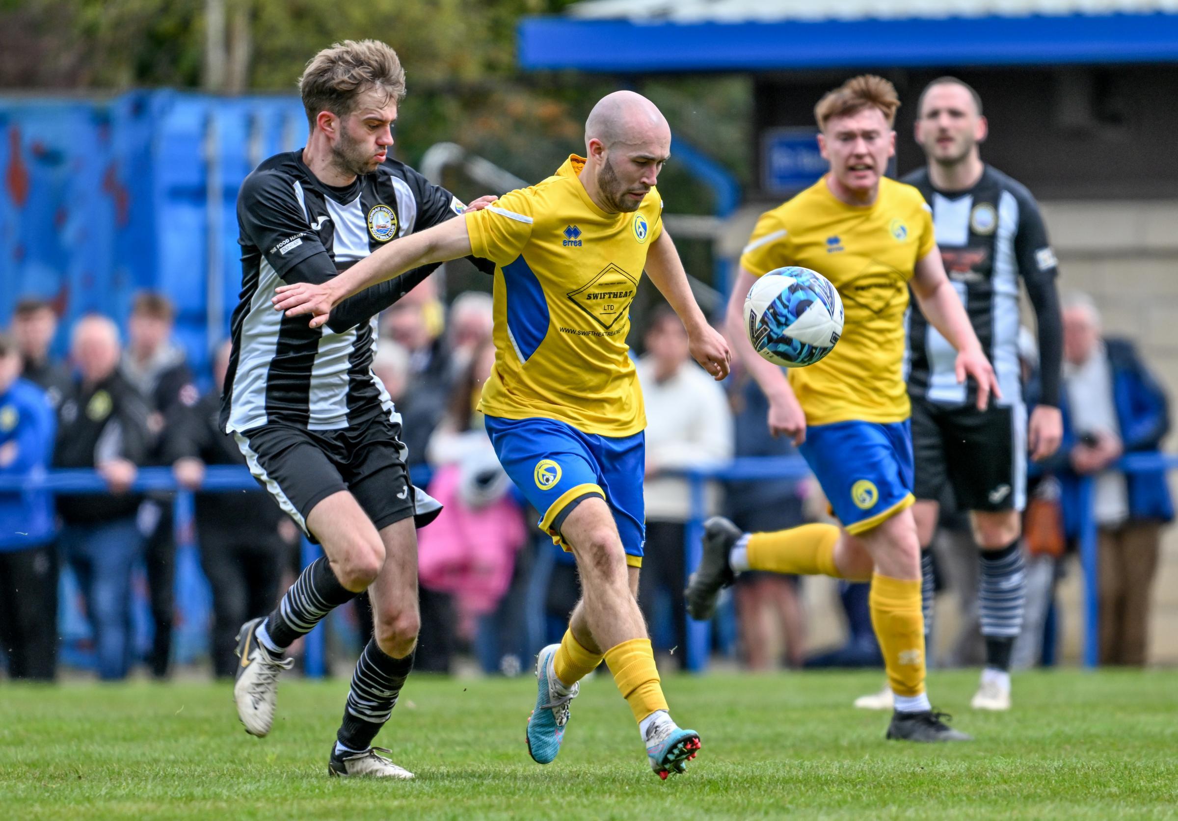 Dunbar United (black and white) travel to Kinnoull this afternoon. Image: Alan Wilson.