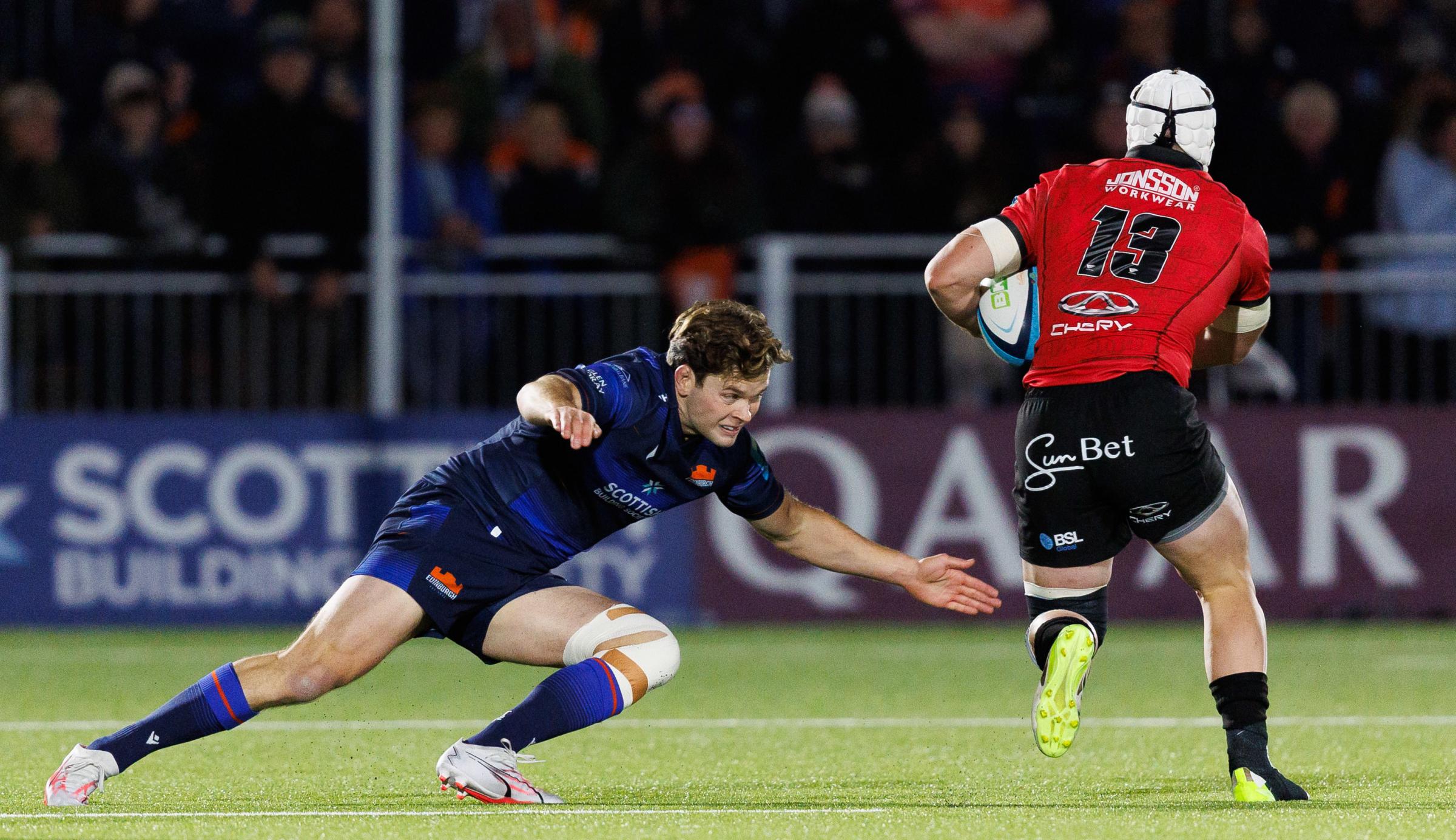 EDINBURGH, SCOTLAND - OCTOBER 28: Chris Dean (left) in action for Edinburgh during a BKT URC match between Edinburgh Rugby and Emirates Lions at the Hive Stadium, on October 28, 2023, in Edinburgh, Scotland. (Photo by Ross Parker / SNS Group).